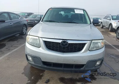 2009 Mazda Tribute I Sport z USA, uszkodzony, nr VIN 4F2CZ02729KM00611
